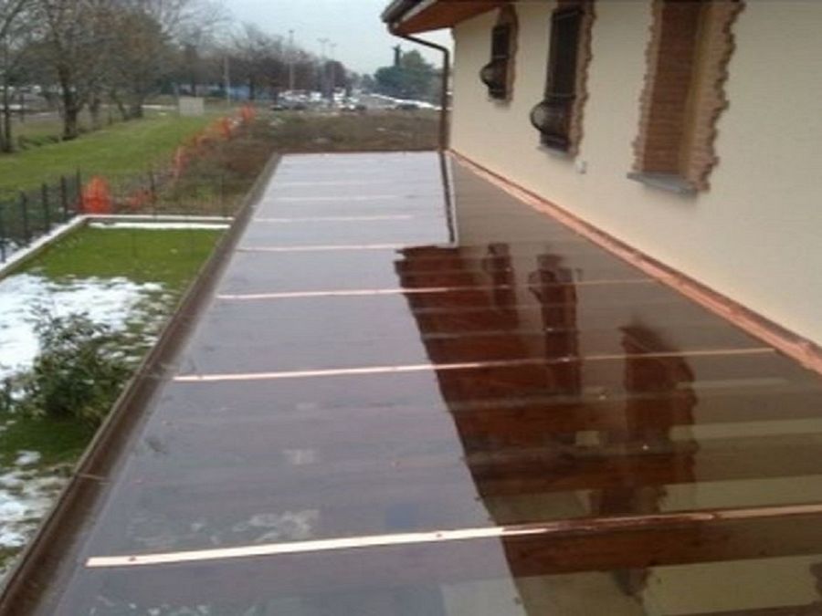 COPERTURE IN VETRO E LEGNO